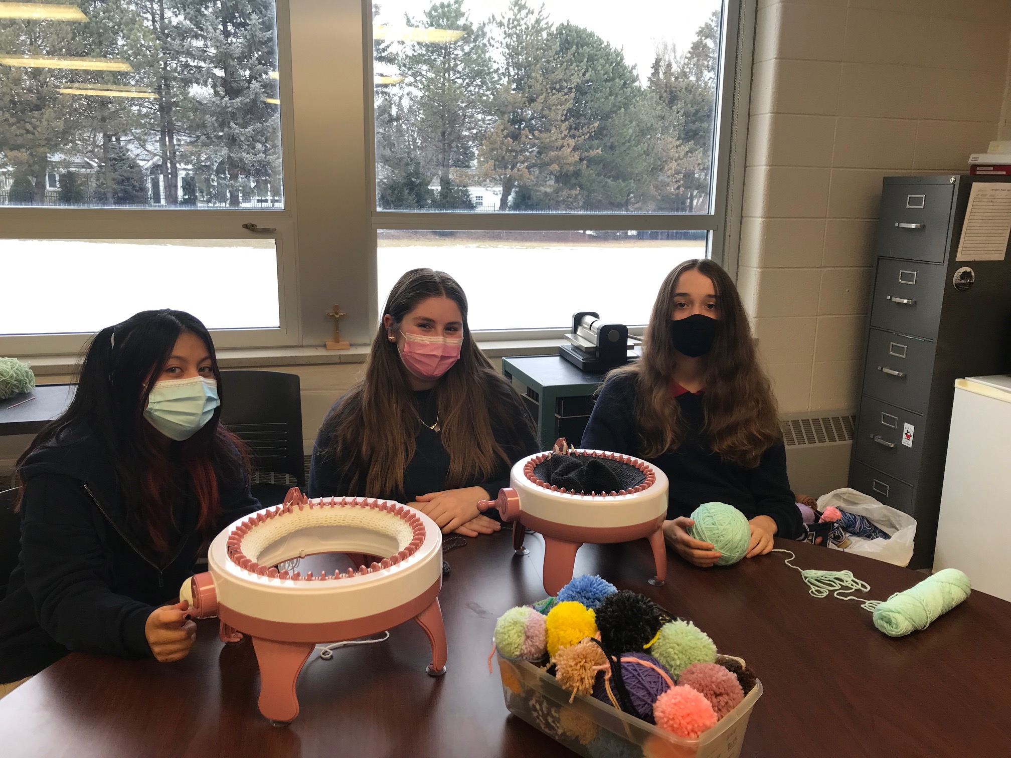 Students from Fr. Allouez Catholic School knit hats to raise funds for HHH